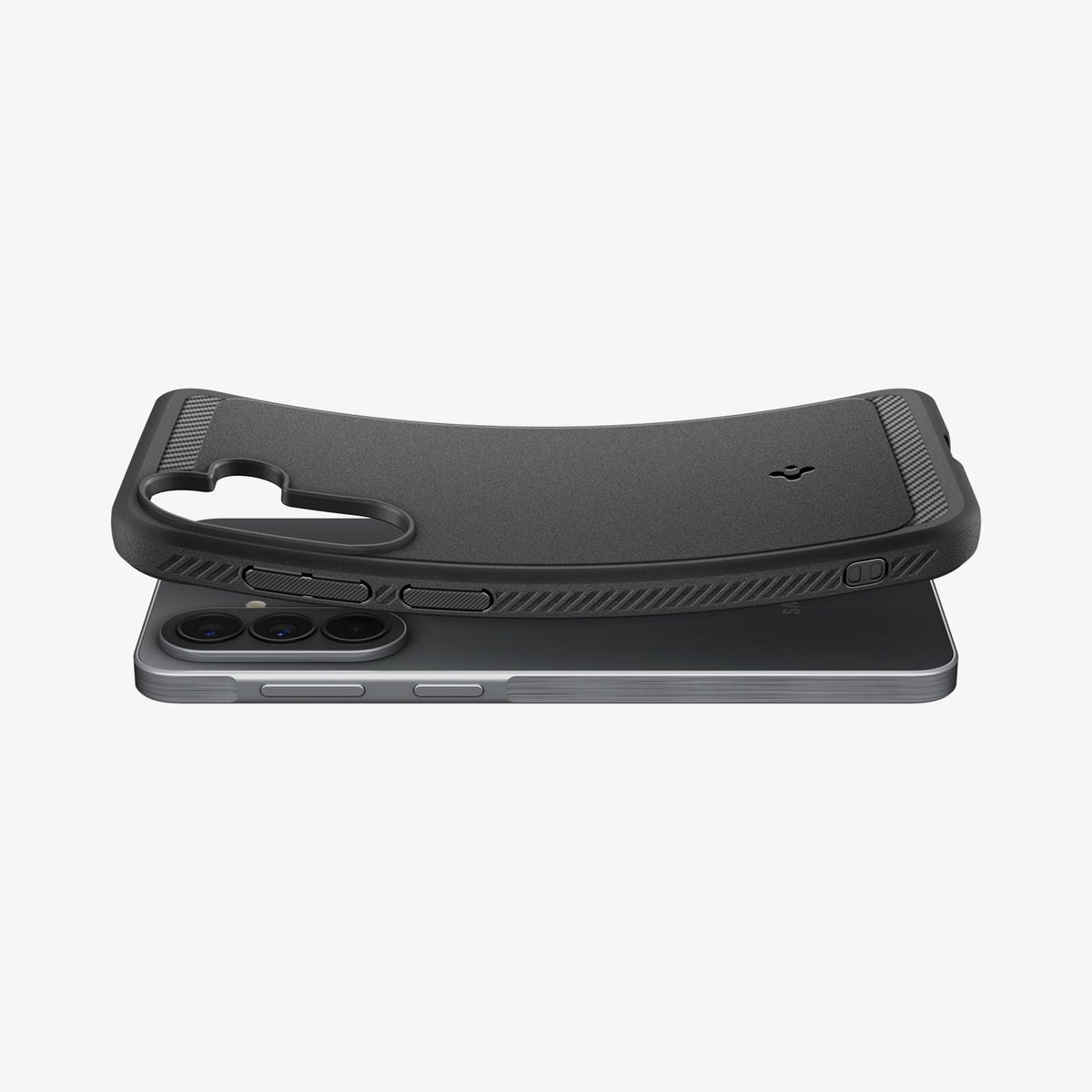 ACS09794 - Spigen Rugged Armor Galaxy A57 5G case in Matte Black lifting away from phone, showing flexible TPU construction