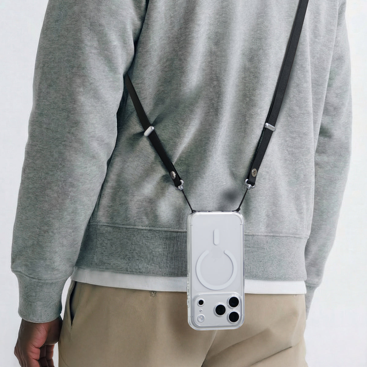 AFA10614 - Spigen Universal Phone Lanyard Strap worn crossbody with phone hanging on back