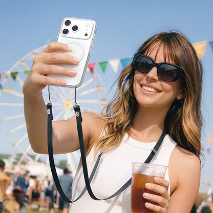 AFA10614 - Spigen Universal Phone Lanyard Strap showing hands free phone use while taking selfie