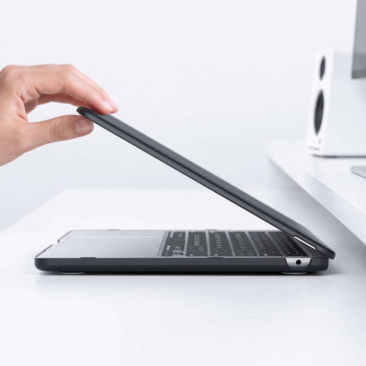 ACS11267 - MacBook Air 15-inch Nano Pop Black Sesame showing the laptop case opening with precise side cutouts for easy port access