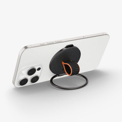 AMP08552 - O-Mag Magnetic Phone Holder (MagFit) OM104 in Black showing the back, top and side of the device o mag ring showing sides, ring propped up as a kickstand in landscape form