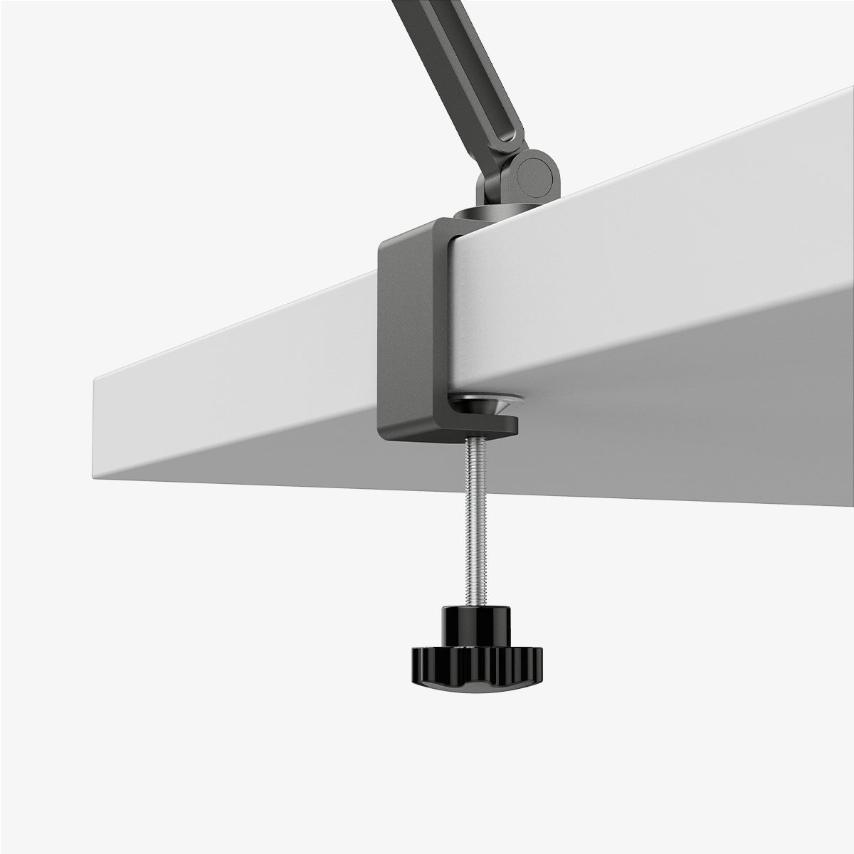 AMP09191 - OneTap Clamp in Space Gray showing the bottom with lock screw attached to the table