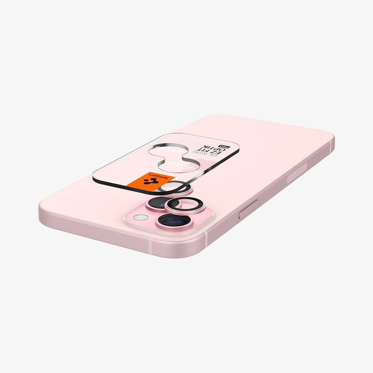 AGL07167 - iPhone 15 Plus Optik Pro EZ Fit Lens Protector in Pinky showing the optic tray hovering above the lens and the device showing back and partial side