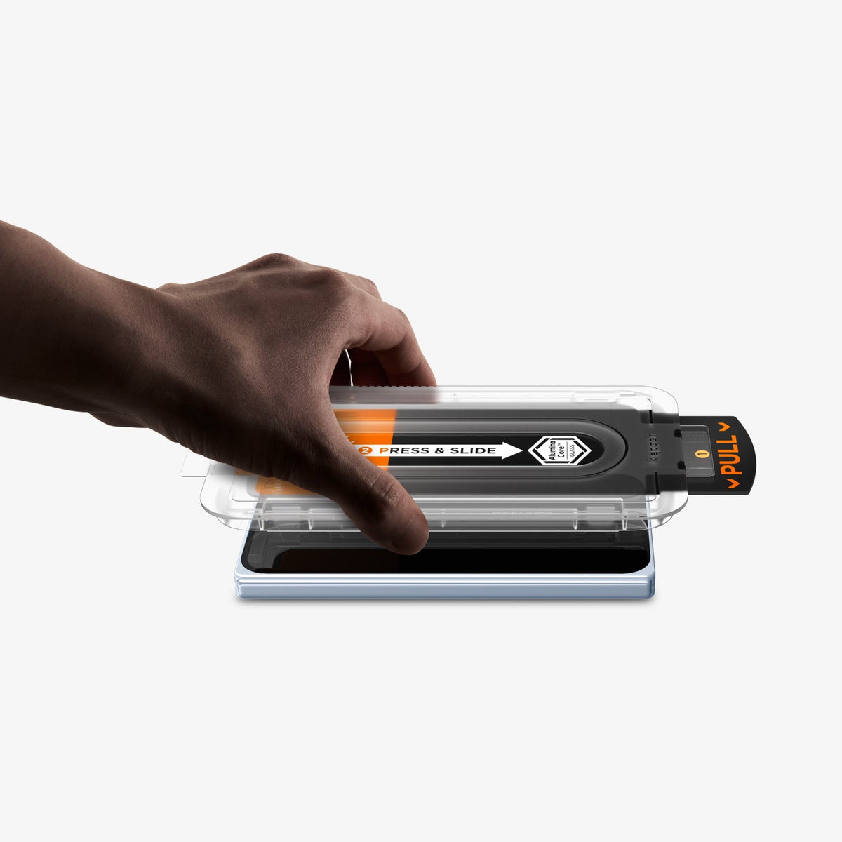 AGL09665 - Pixel 10 Pro Fold Screen Protector EZ Fit Pro GLAS.tR showing a hand placing the ez fit tray onto the device to be installed