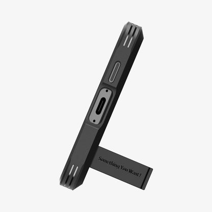 ACS08623 - Galaxy S24 FE Case Tough Armor (MagFit) in Black showing the bottom and a built-in kickstand propped up