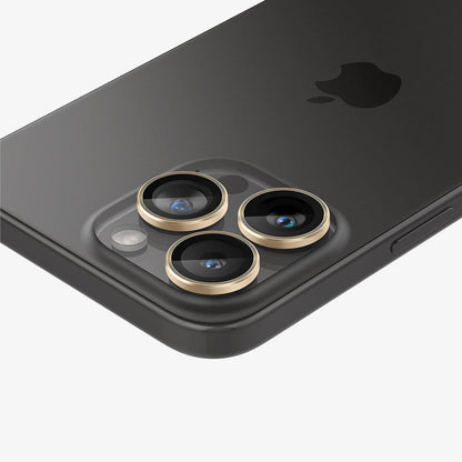 AGL05598 - iPhone 15 Pro / 15 Pro Max Optik Pro Lens Protector in gold showing the back, top and side zoomed in on camera lens