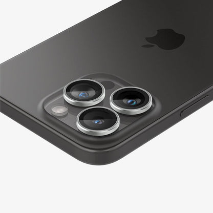AGL05599 - iPhone 15 Pro / 15 Pro Max Optik Pro Lens Protector in silver showing the back, top and side zoomed in on camera lens