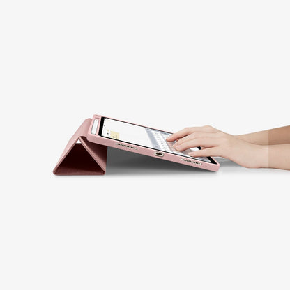 ACS01944 - iPad Air 10.9" Case Urban Fit in rose gold showing hands typing on screen with device propped up by built in kickstand