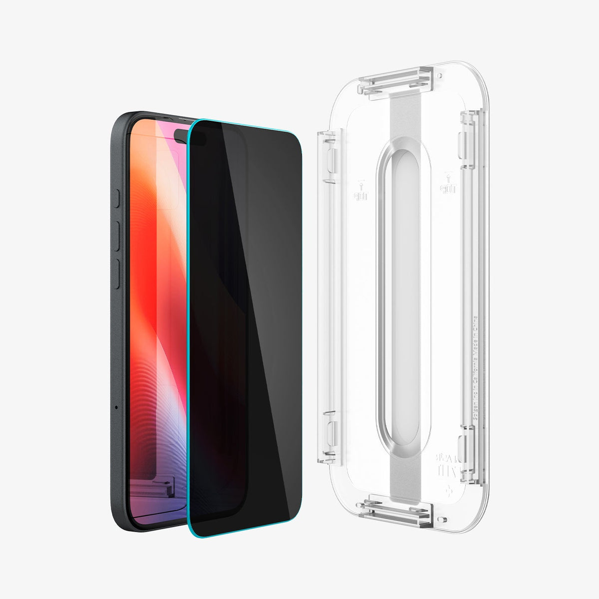 AGL06905 - iPhone 16 GLAS.tR EZ Fit Privacy showing the installation tray in front of the screen protector and the device