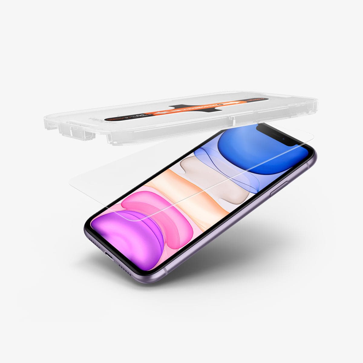 064GL25166 - iPhone XR Screen Protector GLAS.tR EZ Fit showing the ez fit tray and screen protector being installed onto device