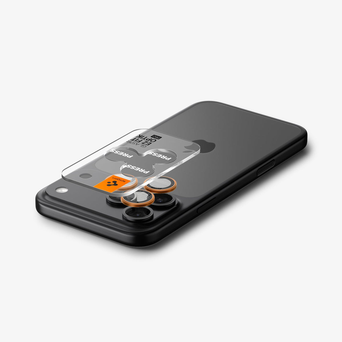 AGL10123 - iPhone 17 Pro Max Optik Pro EZ Fit Lens Protector in orange showing the ez fit tray hovering above the device camera lens