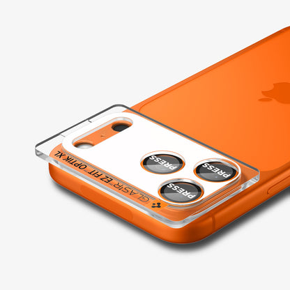 AGL10645 - iPhone 17 Pro Optik Pro XL EZ Fit Lens Protector in orange showing the back, partial side and top with lens screen protector tray attached