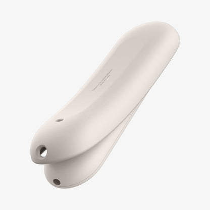 ACS07975 - Google TV Streamer Silicone Fit Voice Remote in Porcelain showing the back, partial side partially peeled from the remote