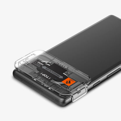AGL05970 - Pixel 7a Glas.tR EZFit Optik Lens Protector in black showing the back, top and side with ez fit tray installed on device camera