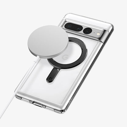 ACP06107 - Magnet Ring Plate (MagFit) in carbon showing a magsafe charger hovering above the device