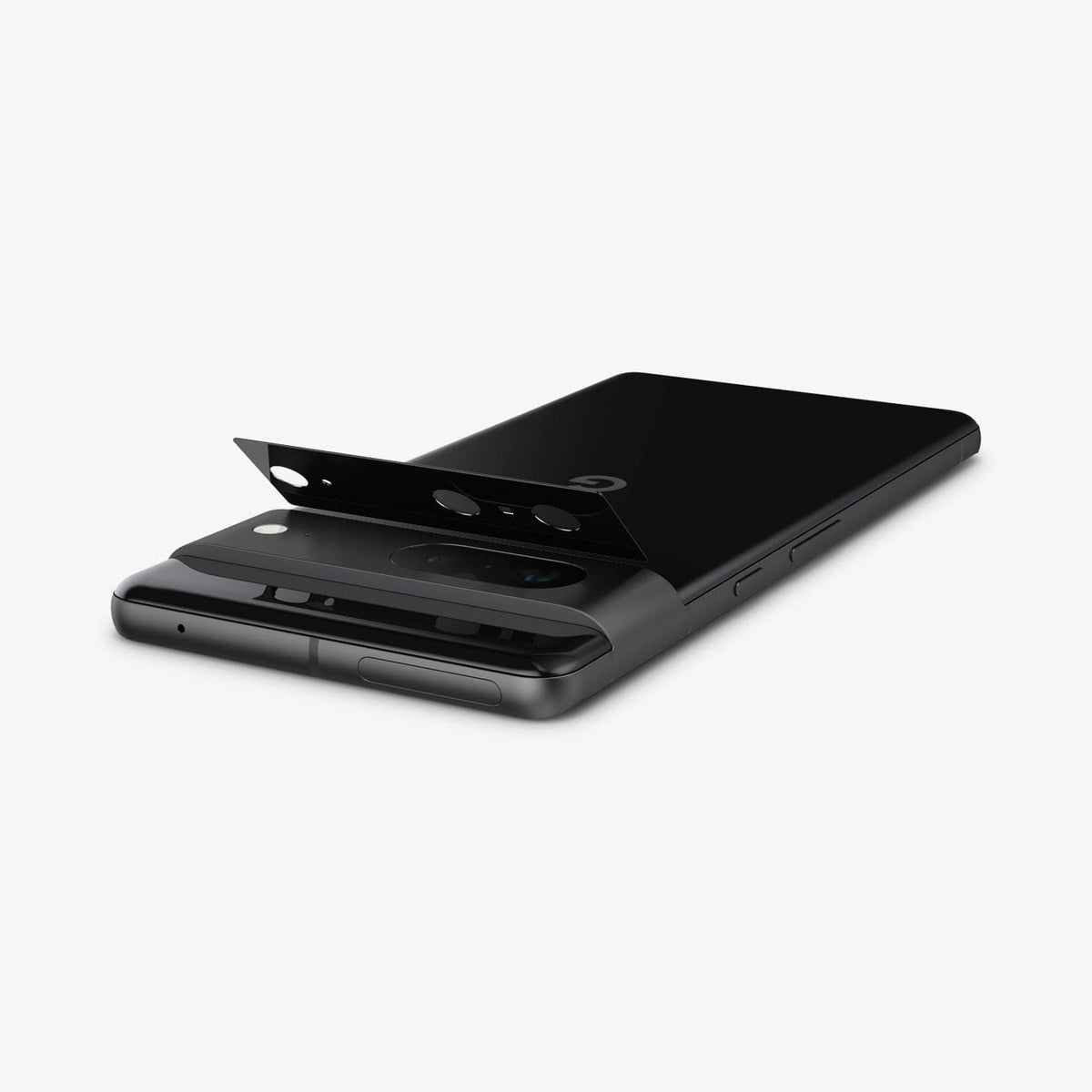 AGL05471 - Pixel 7 Optik Lens Protector in black showing the optik lens protector slightly hovering above camera lens