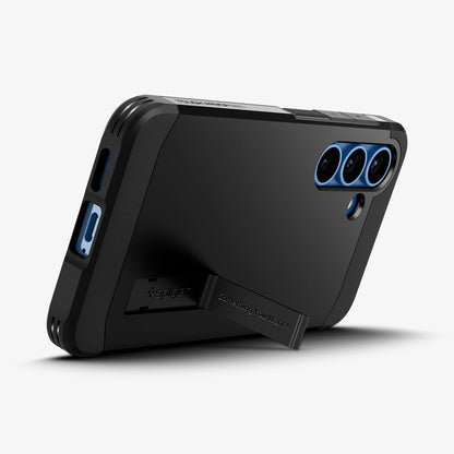 ACS09008 - Galaxy S25 Case Tough Armor AI (MagFit) in Black showing the back, partial bottom with built-in kickstand propped up