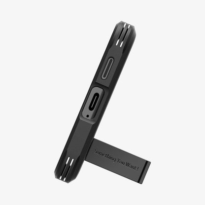 ACS07355 - Galaxy S24 Case Tough Armor in Black showing the bottom with a built-in kickstand propped up