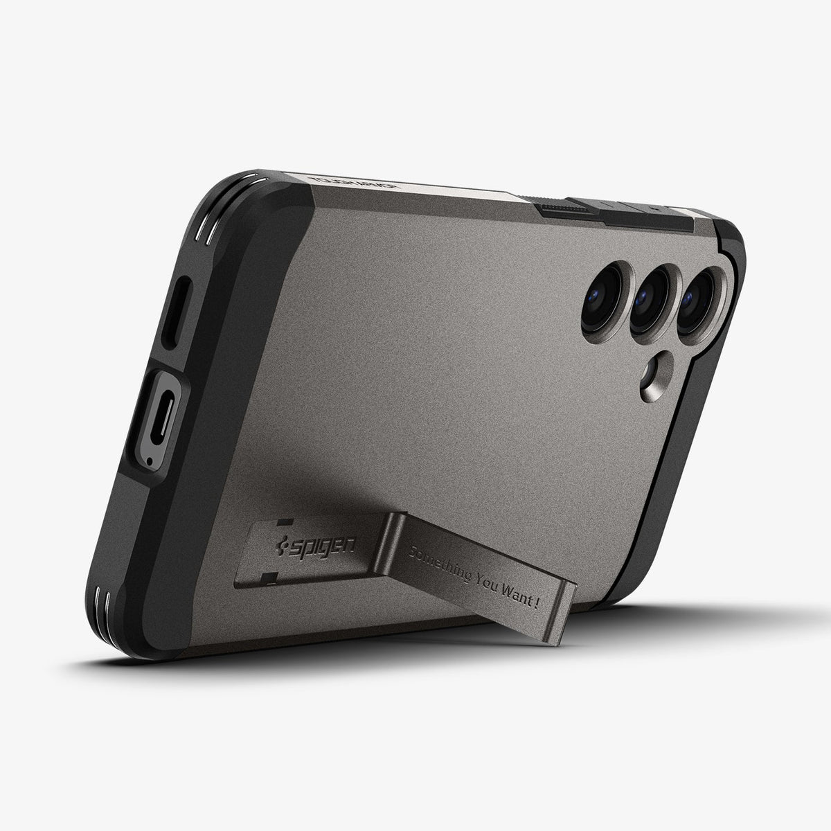 ACS07356 - Galaxy S24 Case Tough Armor in Gunmetal showing the back, partial side and bottom with a built-in kickstand propped up