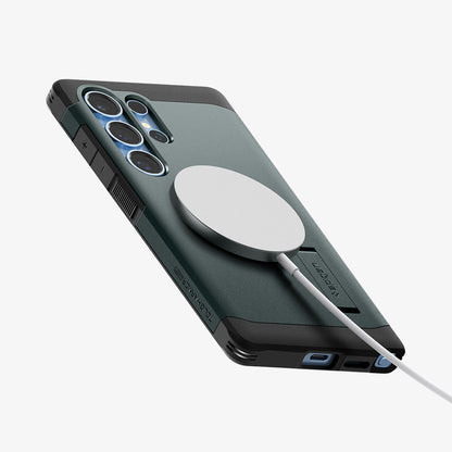 ACS08966 - Galaxy S25 Ultra Case Tough Armor AI (MagFit) in Abyss Green showing the back, partial side and bottom with magsafe charger attached