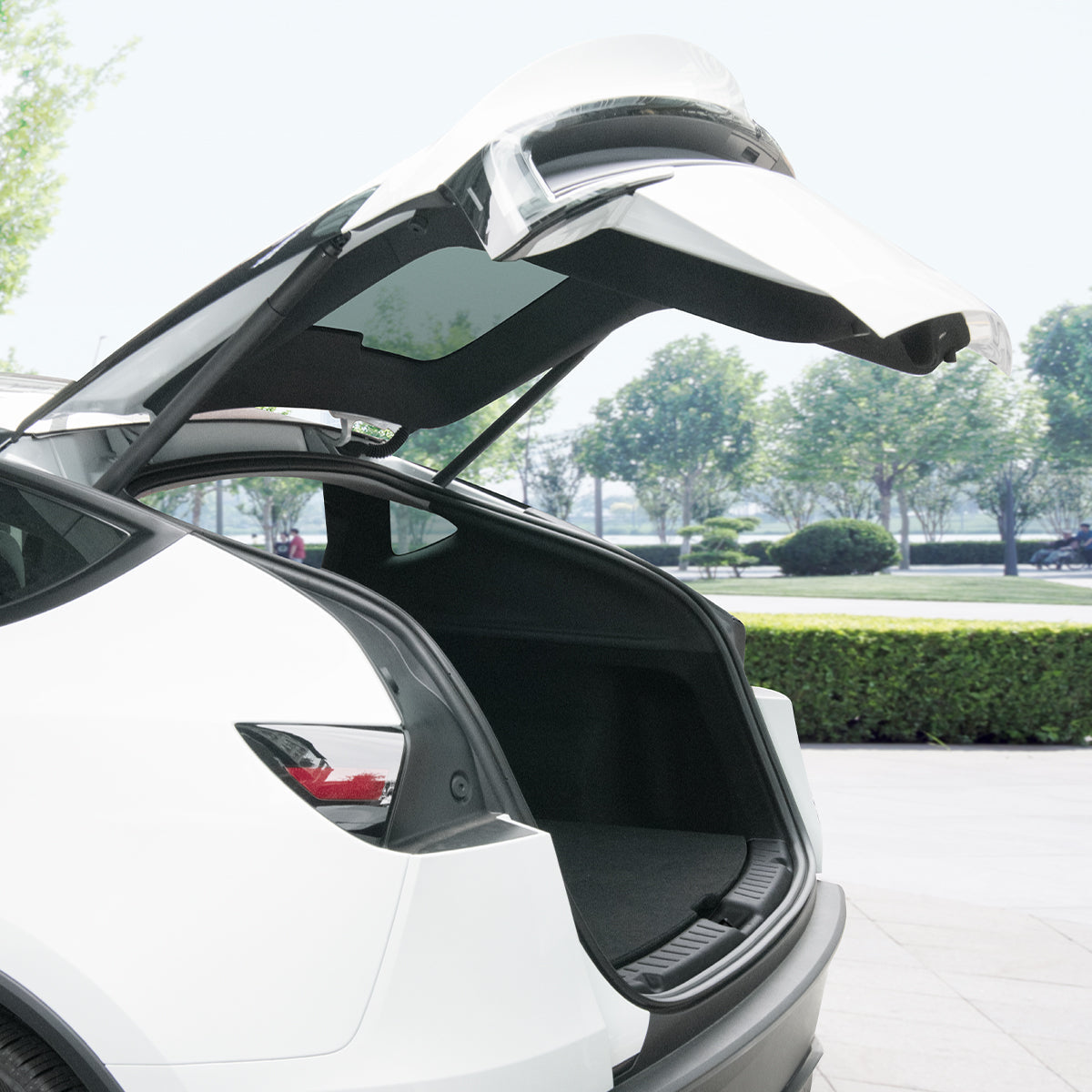 ACP09759 - Tesla Model Y Juniper Trunk Sill Guard | TG100-YJ in black showing the side view installed in trunk