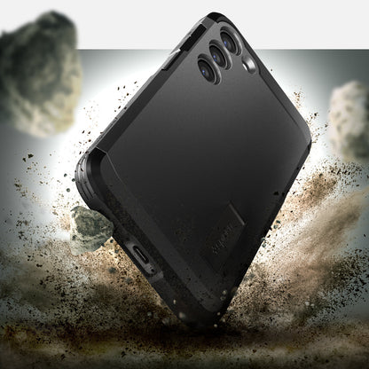 ACS05718 - Galaxy S23 Case Tough Armor in black showing back in front of the rock.