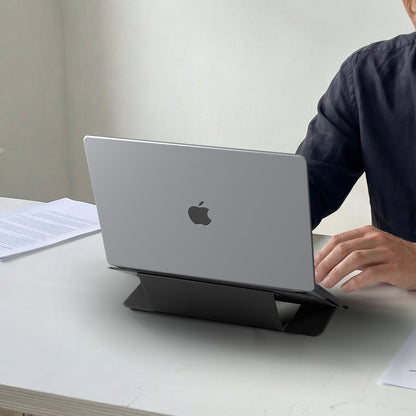 AMP11116 - Slim Fold Laptop Stand | LD201-S7 showing back view of person using iPad propped up on laptop stand