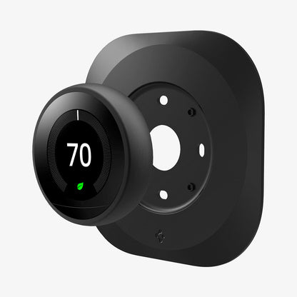 AHP03711 - Google Nest Learning Thermostat 3G Wall Plate in black showing the google nest hovering in front of wall plate